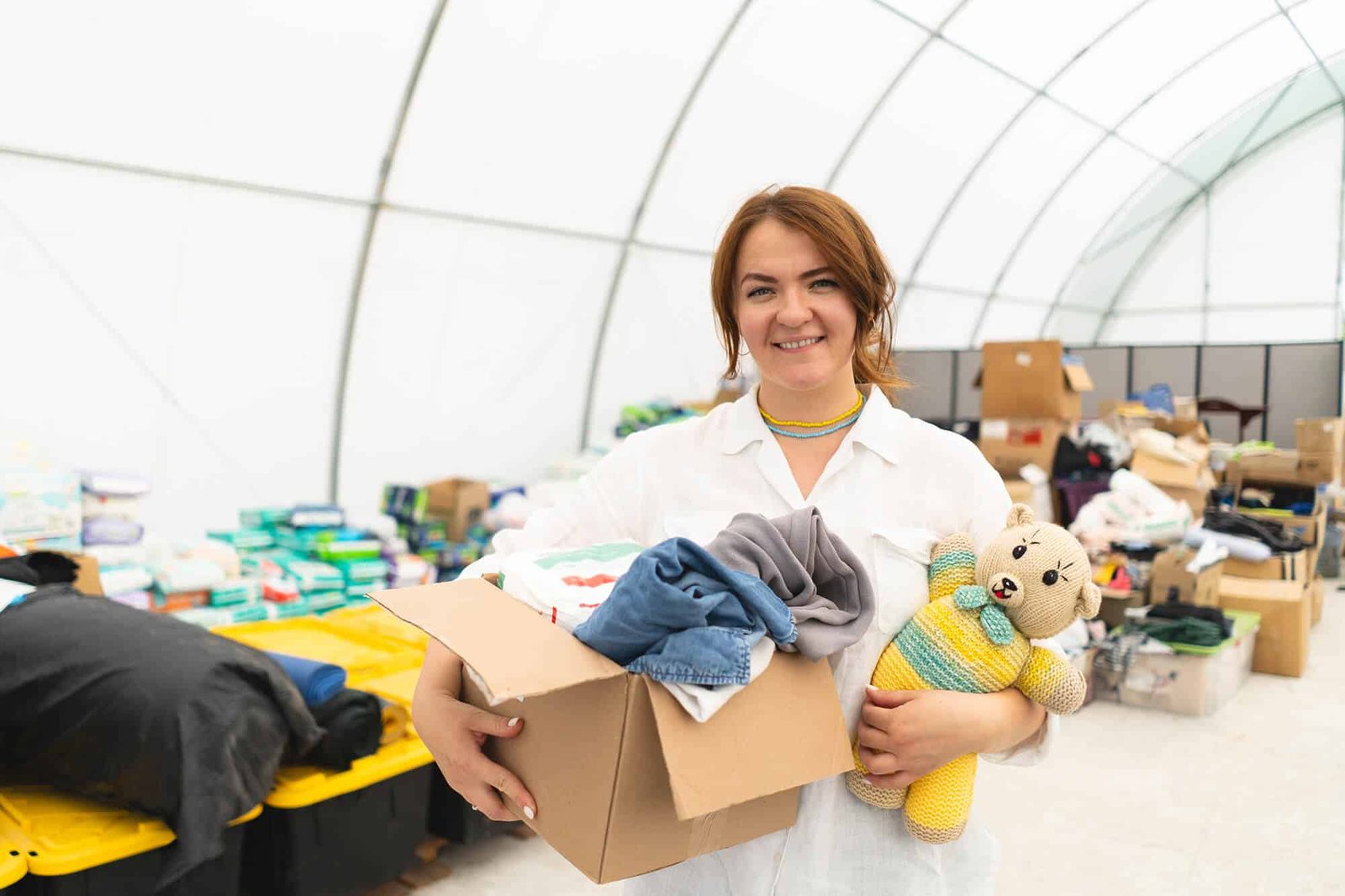 volunteer-woman-preparing-donation-boxes-for-peopl-2024-03-13-17-48-09-utc.jpeg